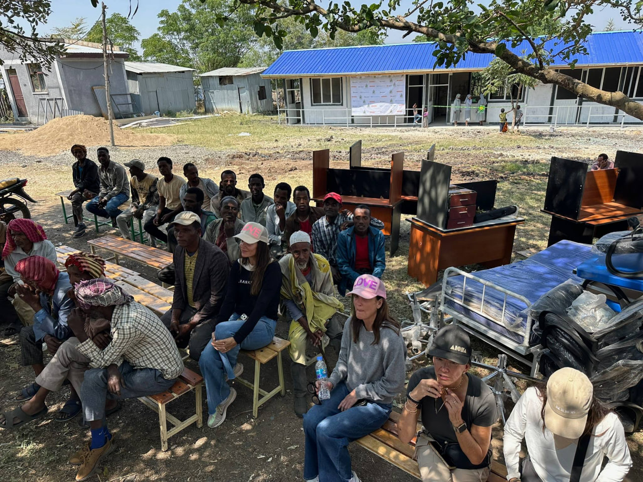 Community members at Yewere Health Centre receiving new furniture and equipment